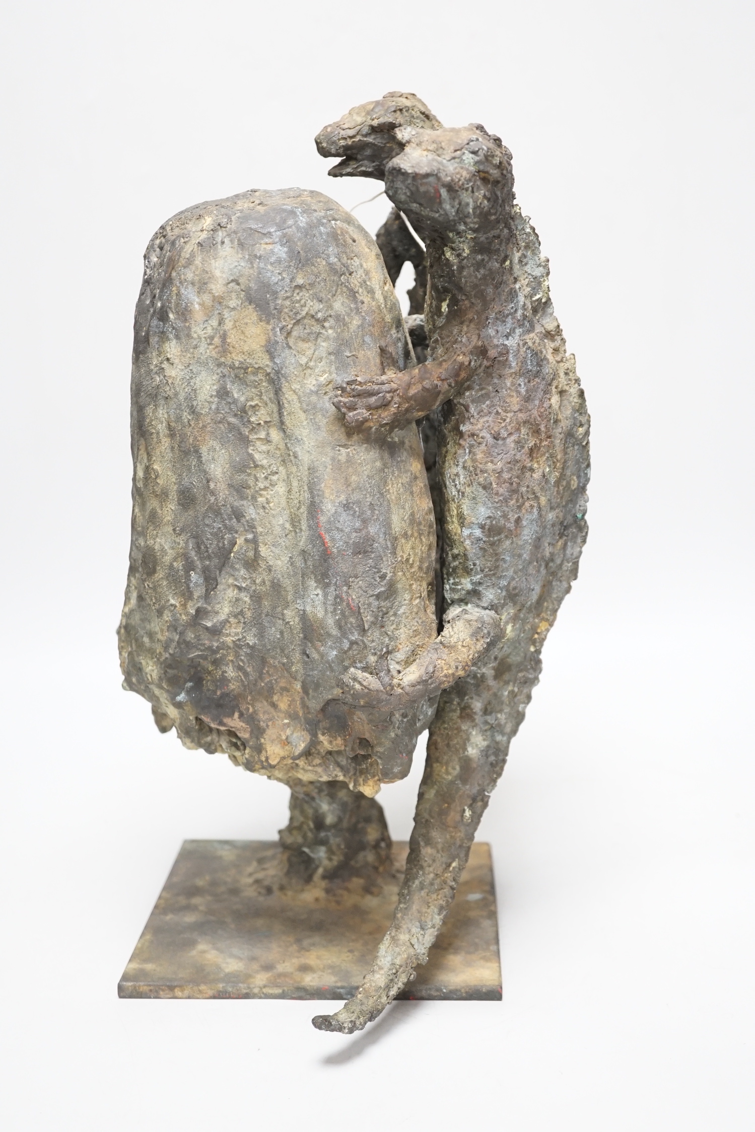A patinated bronze, two lizards scaling a rock, raised on a square base, monogrammed SMV and dated 1992 to the base, 40cm high